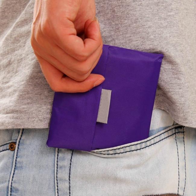 Easy to carry foldable bag demonstration showing portability