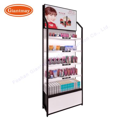 China Advertising Cosmetic Display Shelving Metal Make Up Stands for sale