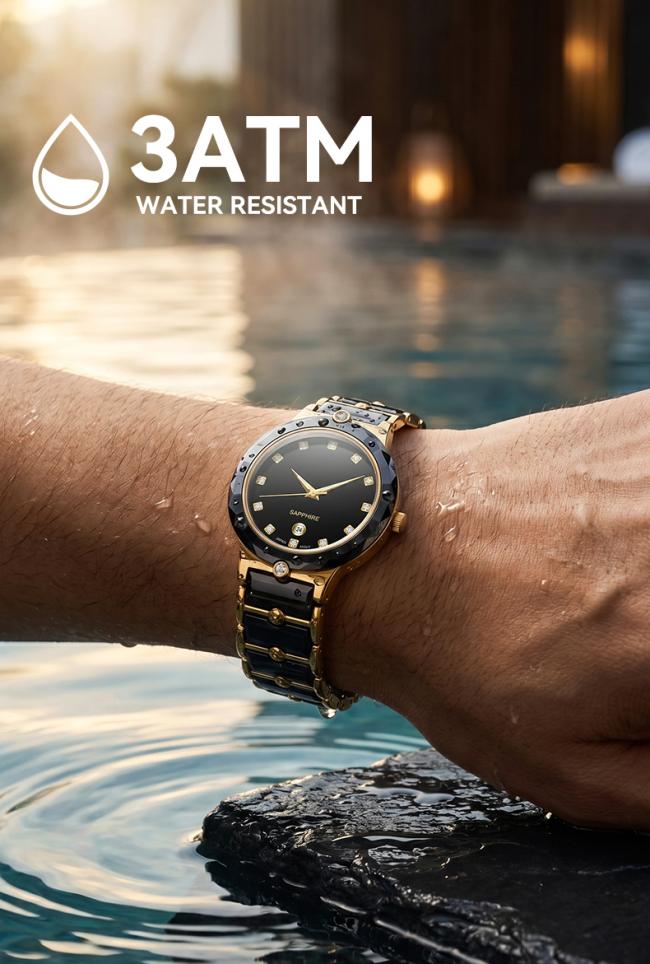 3ATM water-resistant ceramic gold quartz watch on wrist near water feature.