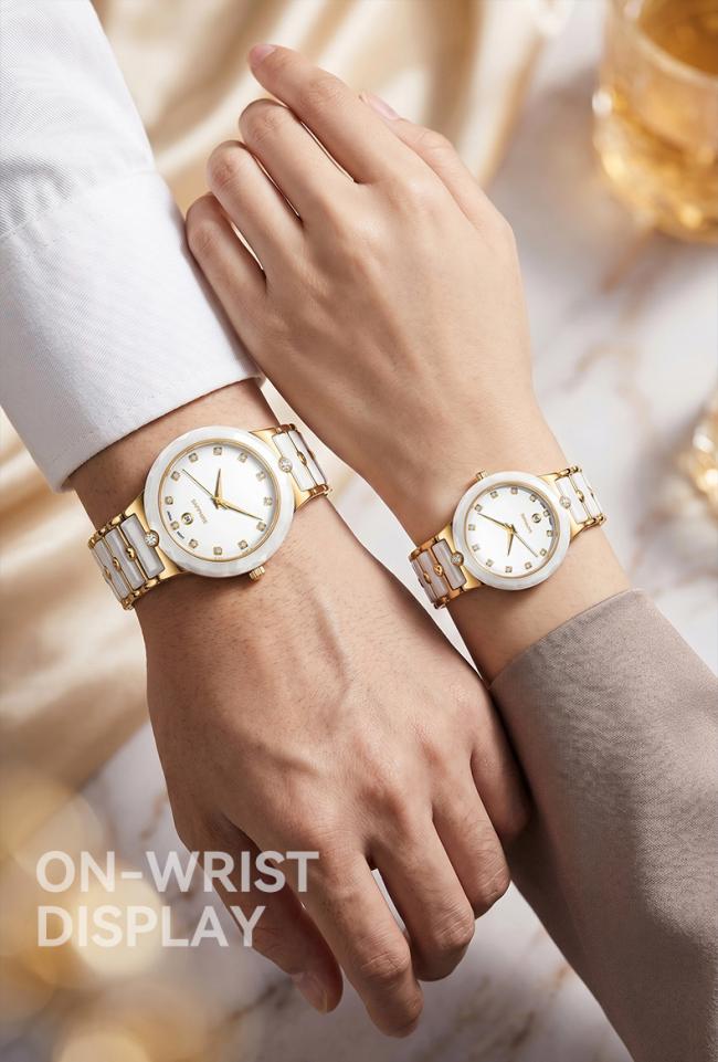 White and gold ceramic quartz couple watch set styled on man and woman wrists.