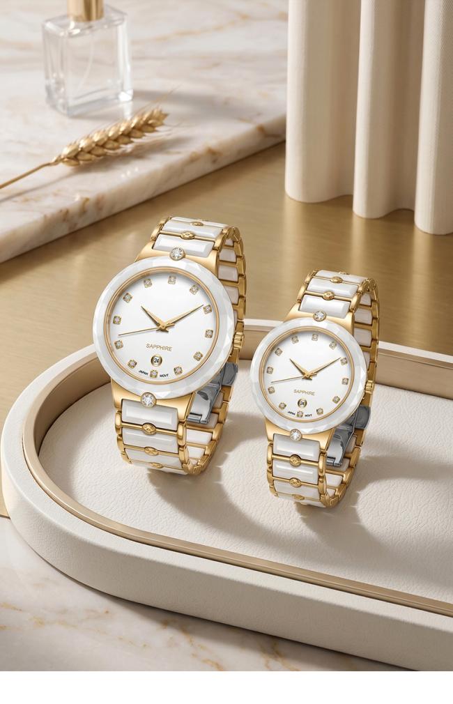 Pair of white ceramic and gold quartz couple watches with sapphire glass display.