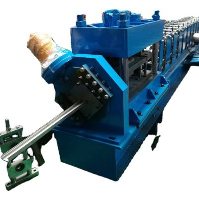 China Guide Rail Cold Roll Forming Machine For Door Door Forming Machine Shutter Door Rail Machine for sale