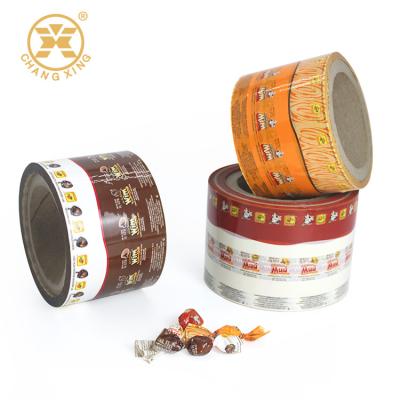 China Candies Chocolates Sweets PET Packaging Roll Film Twistable for sale