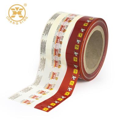 China PET PVC VMPET Candy Twist Chocolate Roll Stock Film Laminated Material à venda