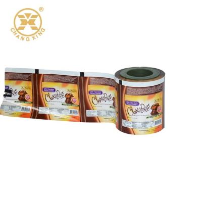 China Chocolate Packing Film Cold Sealing Adhesive Packing Roll Film for sale