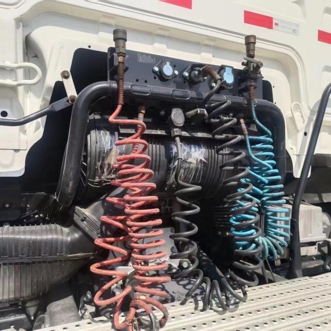 470 Horsepower Man Series Heavy-Duty Tractor with Used Truck