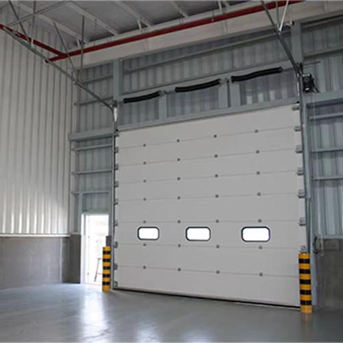 Sectional door operational demonstration in workshop environment