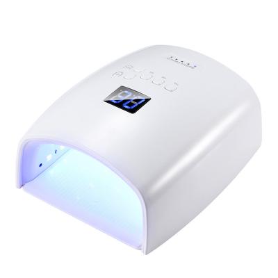 China Professional Wireless UV Nail Lamp Rechargeable Two Light Color 48w Led Nail Lamp Convenient Nail Dryer Lamp for sale