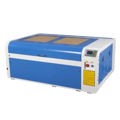 China 50W Outras máquinas Máquina de gravação a laser de CO2 para cortar tecidos acrílicos de madeira à venda