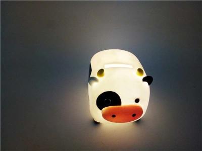 China Penny Pig Bank Money Saving Box Coin Counter with LED Light for sale