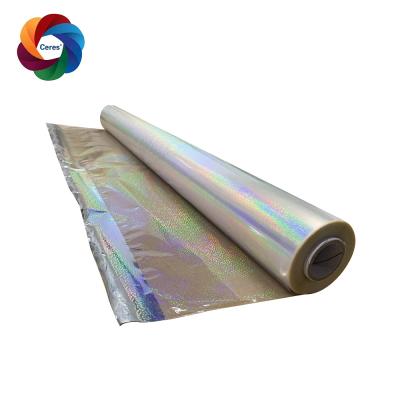 China 120 Meter Roll Hot Stamping Film 64cm Width 18 Mic Silver Rainbow Foil for sale