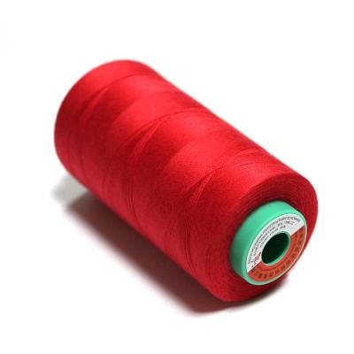 China 402 Fios de costura de poliéster tingido Fios de poliéster ligados UV vermelho à venda