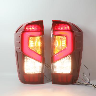 China Waterproof Headlight Tail Light Auto Running ABS LED For Nissan Navara for sale