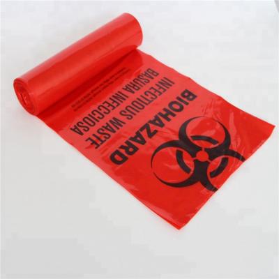 China 24 X 31in Plastic Red Biohazard Trash Bag Roll Nursing Home Use for sale