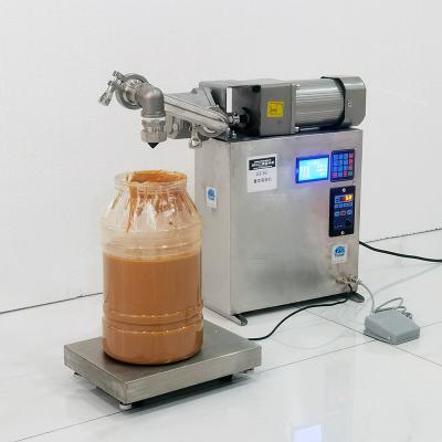 China Stainless Steel Liquid Filing Machine Small Automatic Oil Filling Machine for sale