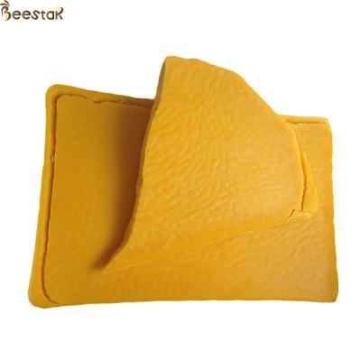 China Grade B Pure Organic Beeswax For Cosmetics And Pharmacenticals for sale