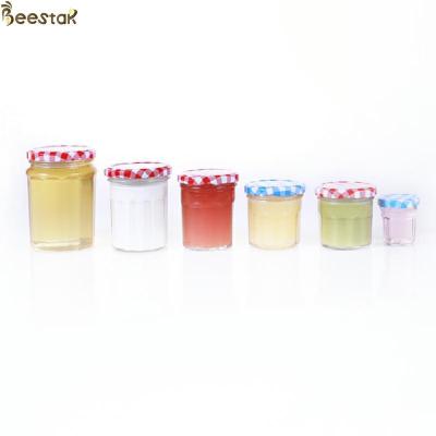 China 150ml 200ml 250ml 380ml Honey Jar And Spoon Wide Mouth With Thin Screw Metal Lid for sale