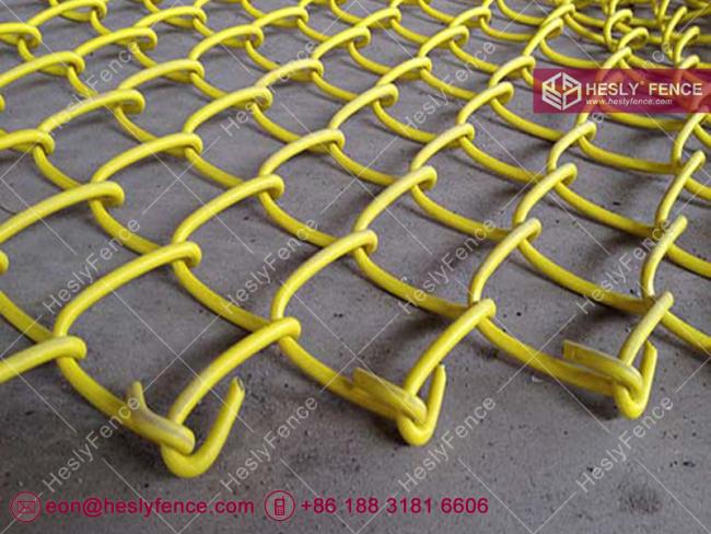yellow chain link fence
