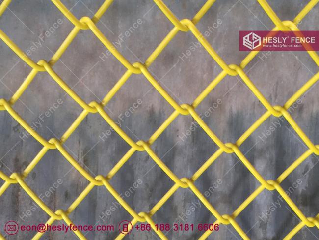 yellow chain link mesh fence