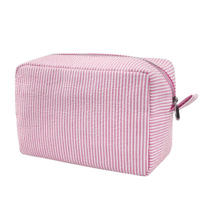 China Toiletry Stripe Cosmetic Bag Durable Women Aesthetic Organizer Storage Pouch for sale