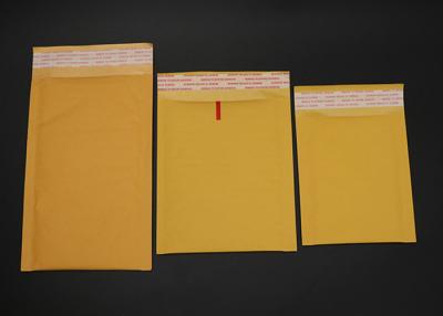 China Os sacos de empacotamento do correio de papel do pacote do porte postal forram envelopes de envio para o correio da segurança à venda