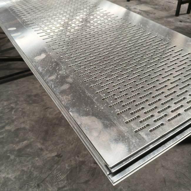 Perforated metal plate with hexagonal hole pattern