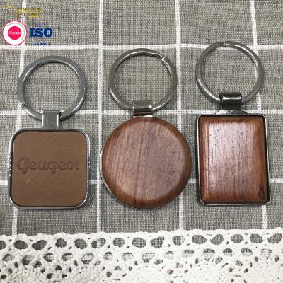 China Laser Wood Carved Keychain Creative Logo Name Personalised Keychain Blank Sublimation for sale