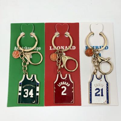 China El chaleco de encargo del metal del llavero del jersey del baloncesto del número 24 forma la cadena dominante personalizada en venta