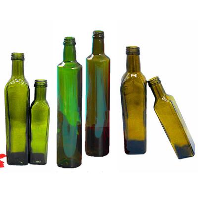 China Glass Base Material 750ml Round Dark Green Camellia Walnut Oil Bottle with Cork Sealing Type for sale