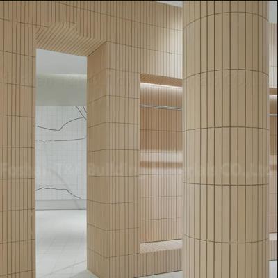 China Mosaic Light Yellow Clothing Store Marble Stone Tile Long Strip Commercial Background Wall Tiles en venta