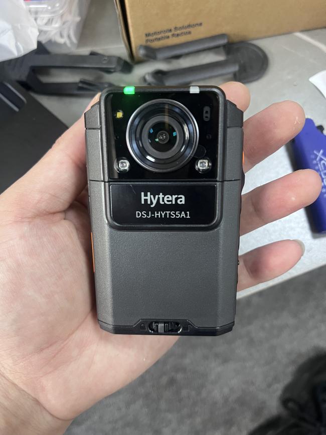 Hytera SC580 body camera side profile with belt clip attachment