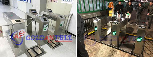 Turnstile gate installation at commercial building entrance