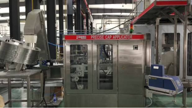 Cap applicator front view