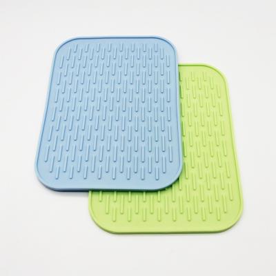 China Kitchen Customized Hot Pot FDA Silicone Table Mat for sale