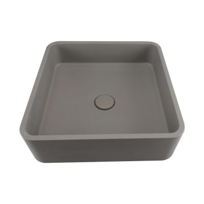 China Countertop Mounted Concrete Wash Basin With Center Drain Location Matte Finish for sale