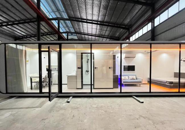 Modern Smart Capsule House exterior showing circular window and sleek design