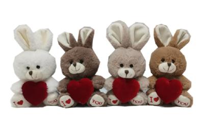 China La felpa suave del día de tarjetas del día de San Valentín del teñido anudado juega 4 conejos de CLR con el corazón rojo en venta