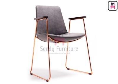 China Rose Gold Armrest Stainless Steel Restaurant Chairs With Antique Leather Covered for sale