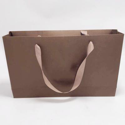 China High End Kraft Paper Bag Printed Ribbon Handle Bags Carry Gift 31.5 X 6.4 X 19cm for sale