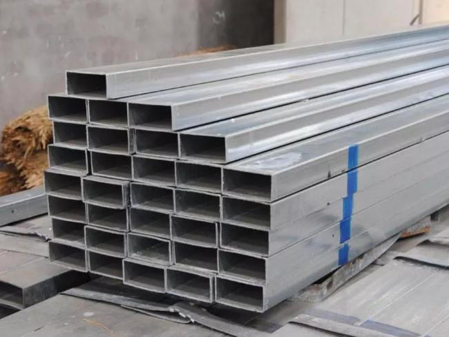 Details of galvanized square steel pipe Galvanized square steel pipe is a name for square pipes and rectangular pipes, that is, steel pipes with equal side lengths. It is made of strip steel that has been processed and rolled. Generally, the strip is unpacked, flattened, coiled, welded to form a round tube, and then rolled into a square tube from the round tube and then cut to the required length. Usually 50 pieces per pack. Also known as square and rectangular cold-formed hollow steel, referred to as square tube and rectangular tube, codenamed F and J respectively. Use of galvanized square steel pipe Galvanized square structure steel pipe is mainly used in curtain wall, construction, machinery manufacturing, steel construction projects, shipbuilding, solar power support, steel structure engineering, electric power engineering, power plant, agricultural and chemical machinery, glass curtain wall, automobile chassis, airport, etc. Details of Galvanized square steel pipe