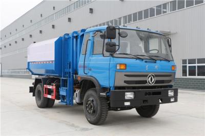 China carga do lado 12CBM e tipo de descarregamento traseiro do combustível diesel de caminhão de lixo do compressor à venda