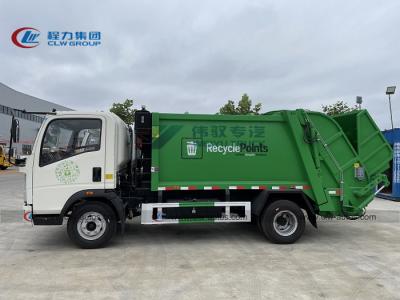 China 140HP 6m3/6000liters/6cbm Howo RHD Rear Load Garbage Truck Waste Collector Truck for sale