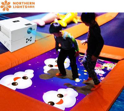 China Juego de proyección interactivo de patio de juego de trampolín Proyector de juego para el piso en venta