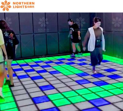 China Jumping Grid LED Dance Floor Tile Interactive Game For Amusement Park for sale