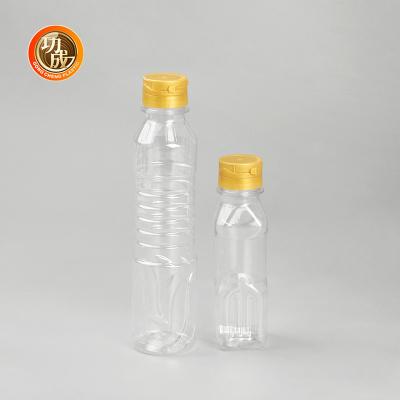 China Botella de aceite comestible de plástico transparente de grado alimenticio 1000ml-1800ml Capacidad para condimentos en venta