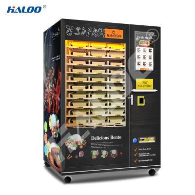 China Máquina automática de venda automática de alimentos congelados com tela grande de 49