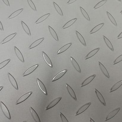 Close-up of checkered plate texture pattern