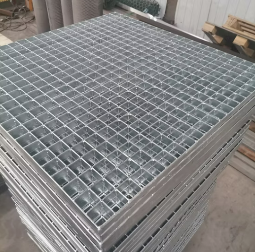 Close-up view of galvanized steel grating press lock connection and flat bar design