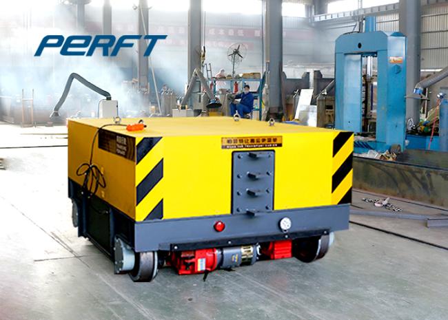 Rail powered transfer flat cart special for traction and dragging of large machinery