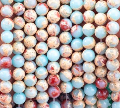 Китай Полудрагоценный камень Шоушан Камень Жаспер Свободные шариковые нити Змеиная кожа Камень для изготовления ювелирных изделий продается